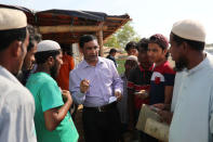 Mohib Ullah, a leader of Arakan Rohingya Society for Peace and Human Rights, speaks to other Rohingya people who face problem to collect relief supplies in Kutupalong camp in Cox's Bazar, Bangladesh April 7, 2019. Picture taken April 7, 2019. REUTERS/Mohammad Ponir Hossain