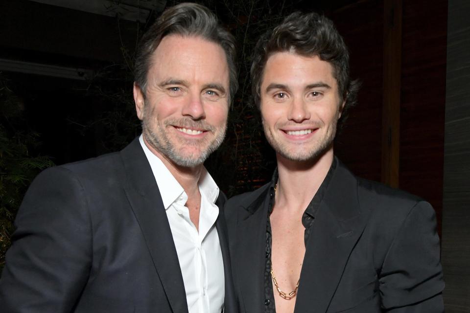 Charles Esten and Chase Stokes attend the Netflix Premiere of Outer Banks Season 3 at Regency Village Theatre on February 16, 2023 in Los Angeles, California.
