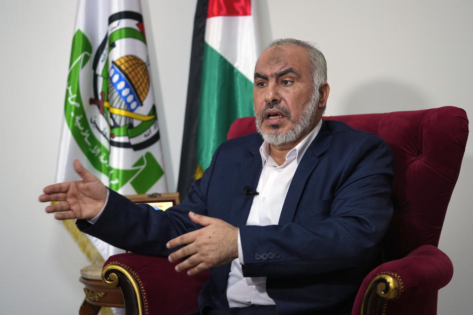 Ghazi Hamad, a member of Hamas' decision-making political bureau, speaks during an interview with The Associated Press in Beirut, Lebanon, Thursday, Oct. 26, 2023. Hamad said that the Palestinian militant group had expected stronger intervention from Hezbollah in its war with Israel, in a rare public appeal to its allies in the region. (AP Photo/Bilal Hussein)