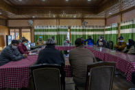 Kashmiri Journalists attend a meeting to discuss the shutting of Kashmir Press Club building, the region’s only independent press club, in Srinagar, Indian controlled Kashmir, Thursday, Jan. 20, 2022. There have been press crackdowns in the region before, especially during periods of mass public uprisings. But the ongoing crackdown is notably worse. The Editors Guild of India accused the government of being “brazenly complicit” and dubbed it an “armed takeover.” Reporters Without Borders called it an “undeclared coup” and said the region is “steadily being transformed into a black hole for news and information.” (AP Photo/Dar Yasin)