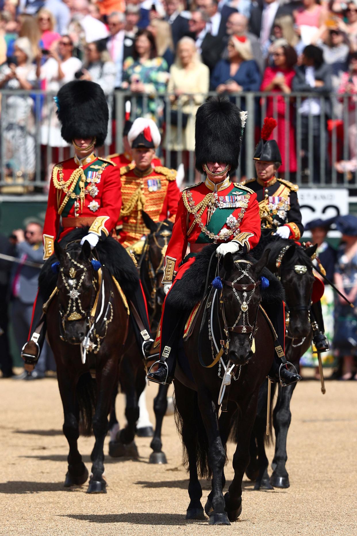 Prince Charles, Prince of Wales, in his role as Colonel of the Welsh Guards, Princess Anne (R), Princess Royal, in her role as Colonel of the Blues and Royals, and Prince William, Duke of Cambridge, (L) in his role as Colonel of the Irish Guards, during the Trooping the Colour parade on June 2, 2022, in London, England. Trooping The Colour, also known as The Queen's Birthday Parade, is a military ceremony performed by regiments of the British Army that has taken place since the mid-17th century. It marks the official birthday of the British Sovereign.