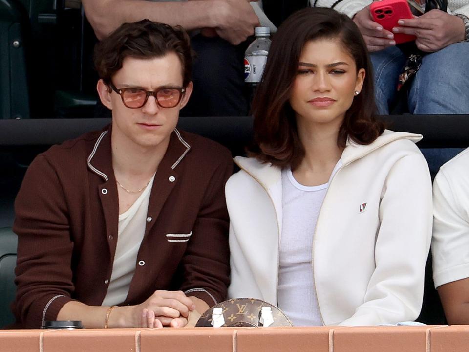 Tom Holland and Zendaya watching the men's final of the BNP Paribas Open at Indian Wells Tennis Garden on March 17, 2024 in Indian Wells, California.