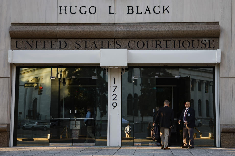 Reporters arrive to cover Joran van der Sloot outside the Hugo Black Federal Courthouse Wednesday, Oct. 18, 2023, in Birmingham, Ala. The chief suspect in Natalee Holloway’s 2005 disappearance is scheduled to appear in court. He is expected to plead guilty Wednesday to trying to extort money from her mother and provide new information about what happened to the missing teen. (AP Photo/Butch Dill )