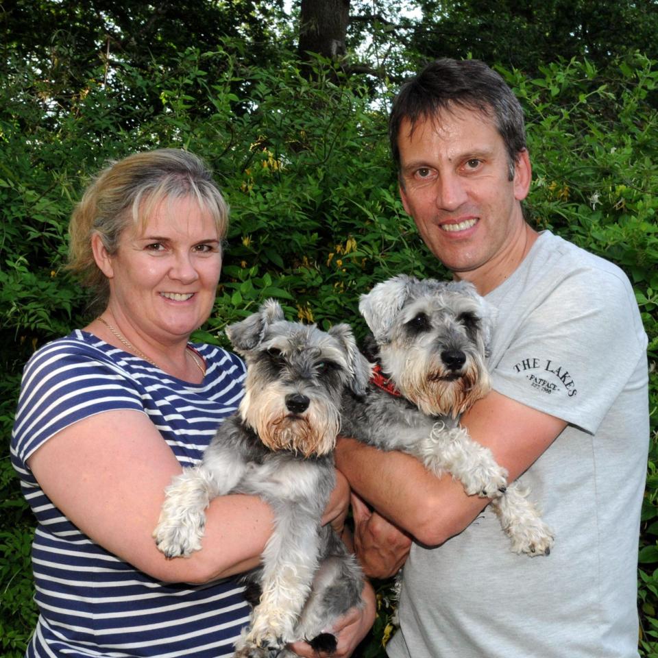 Miniature schnauzers Charlie and Theo were missing for four days after vanishing in thick fog as they were out for a walk - Credit: Caters News Agency