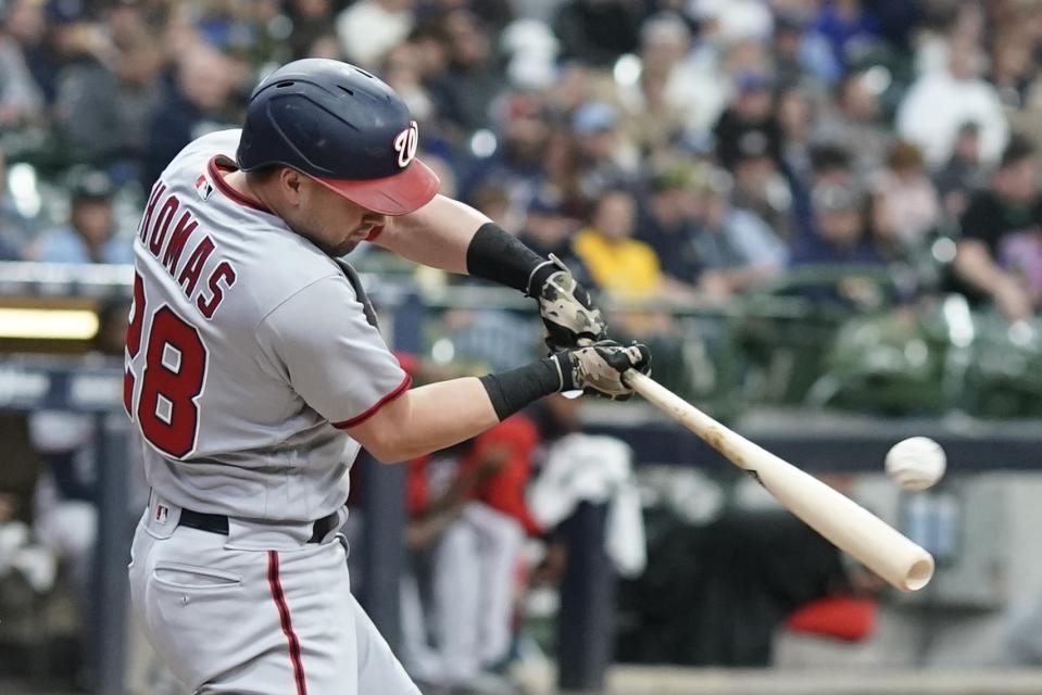 Washington Nationals' Lane Thomas hits a home run during the third inning of a baseball game against the Milwaukee Brewers Saturday, May 21, 2022, in Milwaukee. (AP Photo/Morry Gash)