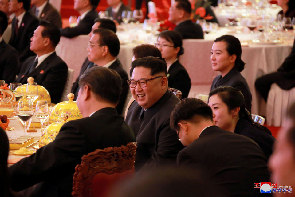 <p>North Korean leader Kim Jong Un smiles during a banquet in Beijing, as he paid an unofficial visit to China, in this undated photo released by North Korea’s Korean Central News Agency (KCNA) in Pyongyang, March 28, 2018. (Photo: KCNA/via Reuters) </p>