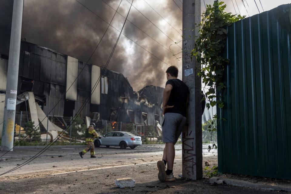 Firefighters work to extinguish a blaze at the site of a Russian missile strike in Odesa, Ukraine (AFP via Getty)