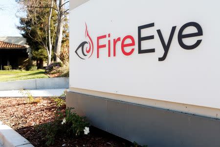 The FireEye logo is seen outside the company's offices in Milpitas, California, December 29, 2014. REUTERS/Beck Diefenbach