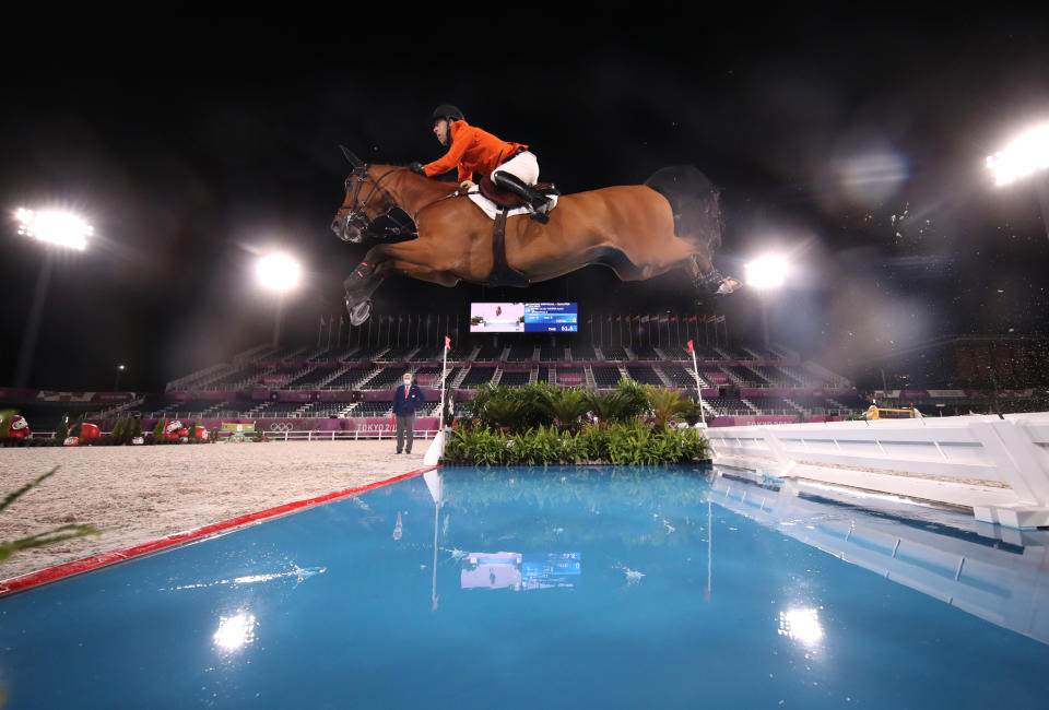 <p>TOKYO, JAPAN - AUGUST 03: Maikel van der Vleuten of Team Netherlands riding Beauville Z competes during the Jumping Individual Qualifier on day eleven of the Tokyo 2020 Olympic Games at Equestrian Park on August 03, 2021 in Tokyo, Japan. (Photo by Julian Finney/Getty Images)</p> 