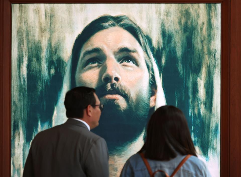 Attendees pick up translation equipment during the 193rd Semiannual General Conference of The Church of Jesus Christ of Latter-day Saints at the Conference Center in Salt Lake City on Saturday, Sept. 30, 2023. | Jeffrey D. Allred, Deseret News