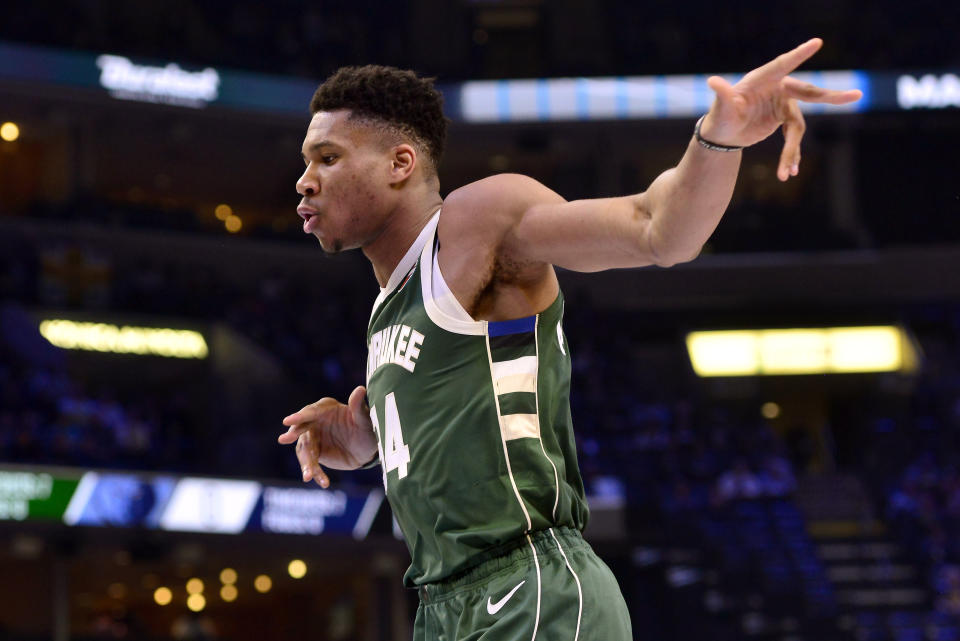 Milwaukee Bucks forward Giannis Antetokounmpo (34) plays in the first half of an NBA basketball game against the Memphis Grizzlies Friday, Dec. 13, 2019, in Memphis, Tenn. (AP Photo/Brandon Dill)