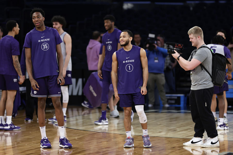 Kansas State guard Markquis Nowell (1) and Nae'Qwan Tomlin (350 look around Madison Square Garden during practice before a Sweet 16 college basketball game at the NCAA East Regional of the NCAA Tournament, Wednesday, March 22, 2023, in New York. (AP Photo/Adam Hunger)