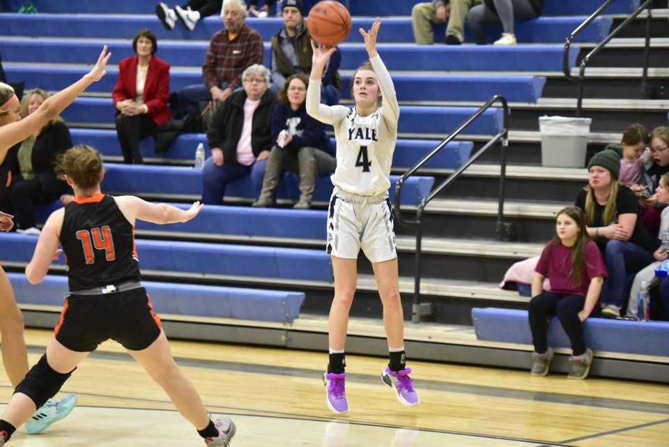 Yale's Sadie Dykstra shoots a 3-pointer during a game earlier this season. She led all scorers with 20 points in the Bulldogs' 45-40 win over Caro in a Division 2 district final on Saturday.