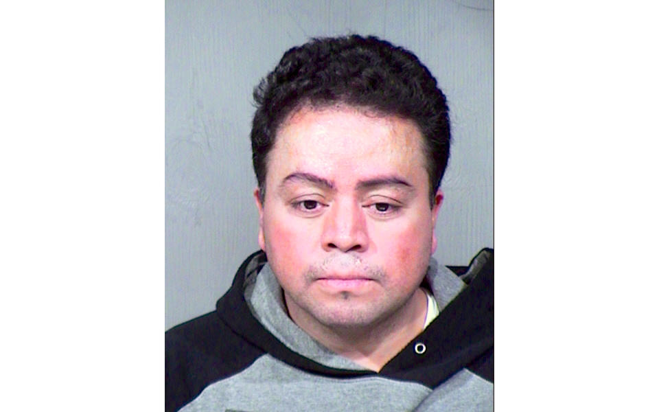This Thursday, Jan. 30, 2020 jail booking photo released by the Maricopa County Sheriff's Office shows Adan Perez Huerta, 32, who was arrested in Toronto and returned to Arizona where he was booked into jail in Phoenix. Huerta, who pleaded guilty in 2003 to murder before fleeing Arizona to avoid being sentenced, has been arrested in Canada 16 years later after police followed digital footprints provided by social media posts of his family and friends, authorities said. (Maricopa County Sheriff's Office via AP)