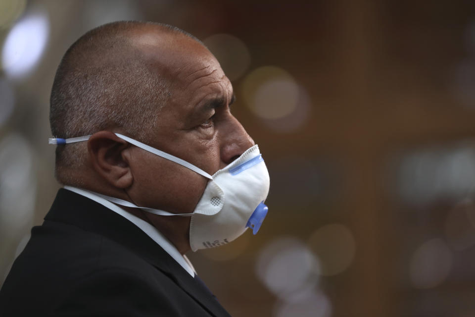 Bulgaria's Prime Minister Boyko Borissov wears a protective face mask as he arrives for an EU summit at the European Council building in Brussels, Friday, July 17, 2020. Leaders from 27 European Union nations meet face-to-face on Friday for the first time since February, despite the dangers of the coronavirus pandemic, to assess an overall budget and recovery package spread over seven years estimated at some 1.75 trillion to 1.85 trillion euros. (AP Photo/Francisco Seco, Pool)