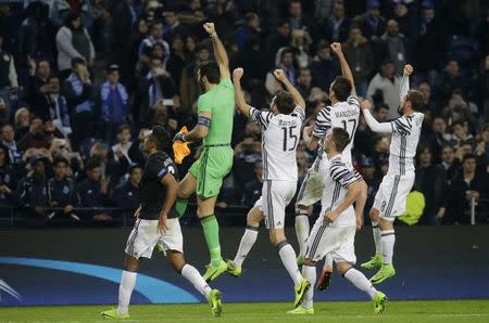 Soccer Football - FC Porto v Juventus - UEFA Champions League Round of 16 First Leg - Dragao Stadium, Porto, Portugal - 22/2/17 Juventus' Gianluigi Buffon celebrates after the match with teammates Reuters / Miguel Vidal Livepic