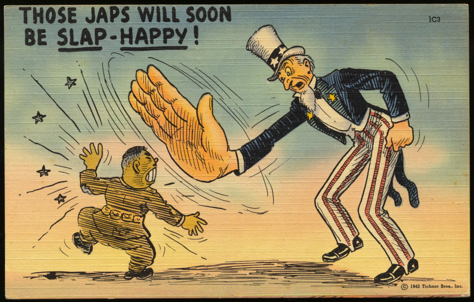 A postcard of Uncle Sam, slapping a Japanese soldier.&nbsp; (Photo: Rykoff Collection via Getty Images)