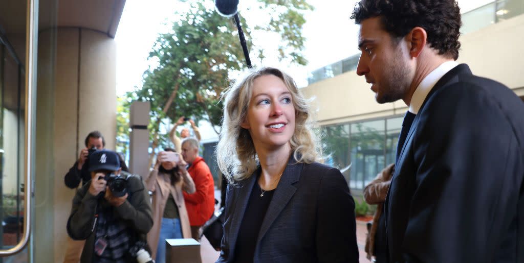 san jose, california   october 17 former theranos ceo elizabeth holmes l arrives at federal court with her partner billy evans on october 17, 2022 in san jose, california holmes appeared in federal court related to an attempt to overturn her fraud conviction she is facing jail time after being convicted of four counts of fraud for allegedly engaging in a multimillion dollar scheme to defraud investors in her company theranos, which offered blood testing lab services photo by justin sullivangetty images