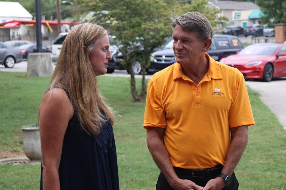 Principal Ashley Speas chats with University of Tennessee System President Randy Boyd before a presentation about the UT Promise program at West High School on Sept. 7, 2022.