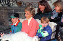 LECH, AUSTRIA - MARCH 27: Princess Diana With Prince William & Prince Harry In Sleigh During Ski Holiday In Lech, Austria. Behind Are Diana's Friends Kate Menzies And Catherine Soames (Photo by Tim Graham/Getty Images)