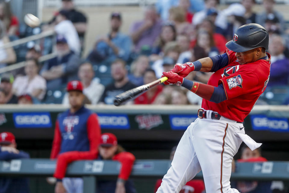 Minnesota Twins' Jorge Polanco hits a solo home run against the Cleveland Guardians during the first inning of a baseball game Friday, May 13, 2022, in Minneapolis. (AP Photo/Bruce Kluckhohn)