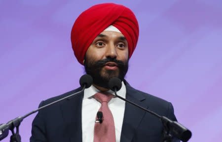 FILE PHOTO: Canadian Minister of Innovation Science and Economic Development, Navdeep Bains, introduces Blackberry CEO John Chen (not pictured) at the North American International Auto Show in Detroit, Michigan, U.S., January 15, 2018. REUTERS/Rebecca Cook