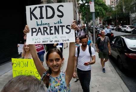 People march in protest against the Trump administration policy of separating immigrant families suspected of illegal entry, in New York, NY, U.S., June 20, 2018. REUTERS/Brendan McDermid