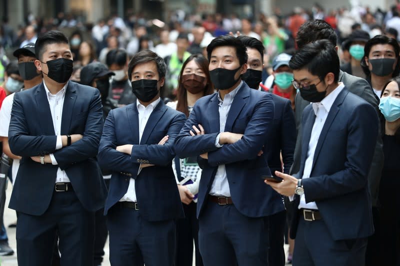 Anti-government demonstrators attend a protest in Central, Hong Kong