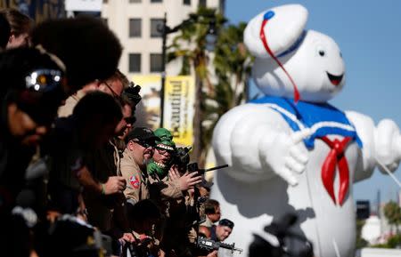 Fans wait at the premiere of the film "Ghostbusters" in Hollywood, California U.S., July 9, 2016. REUTERS/Mario Anzuoni