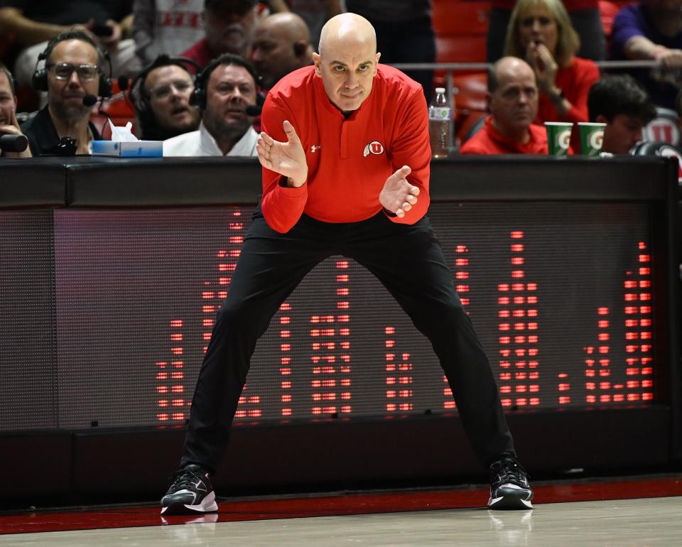 Utah Utes head coach Craig Smith claps his approval as Utah and Washington play at the Huntsman Center at the University of Utah in Salt Lake City on Sunday, Dec. 31, 2023. Utah battled back for a 95-90 win. | Scott G Winterton, Deseret News