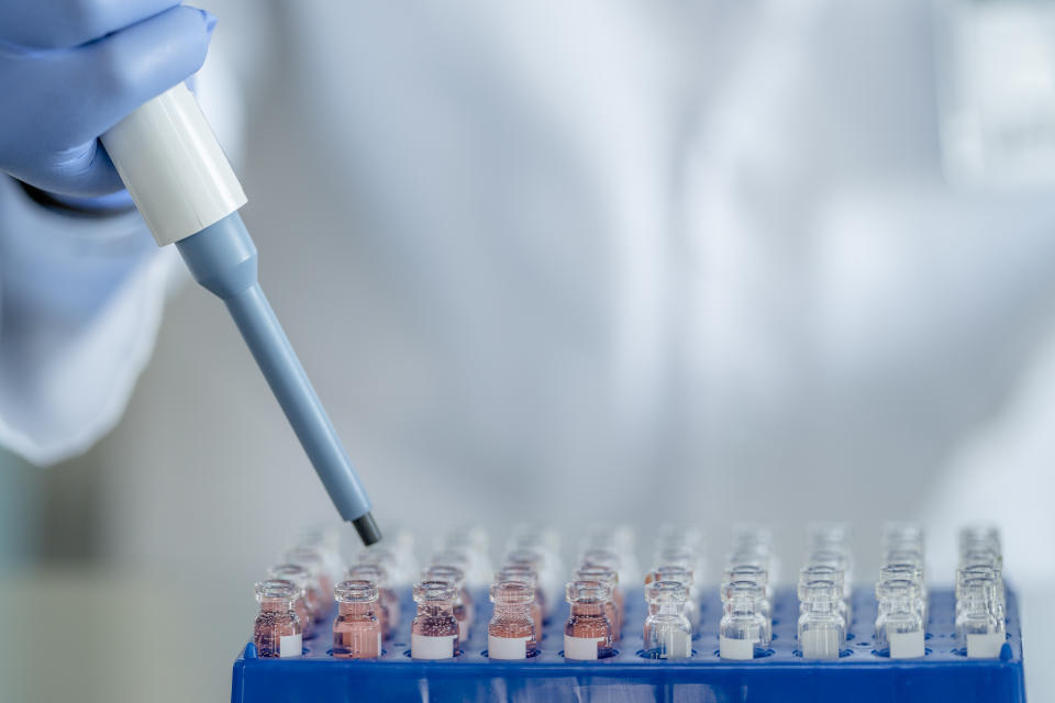 A male in his 30s of Indian ethnicity, working in a scientific laboratory searching for a vaccine for COVID-19.