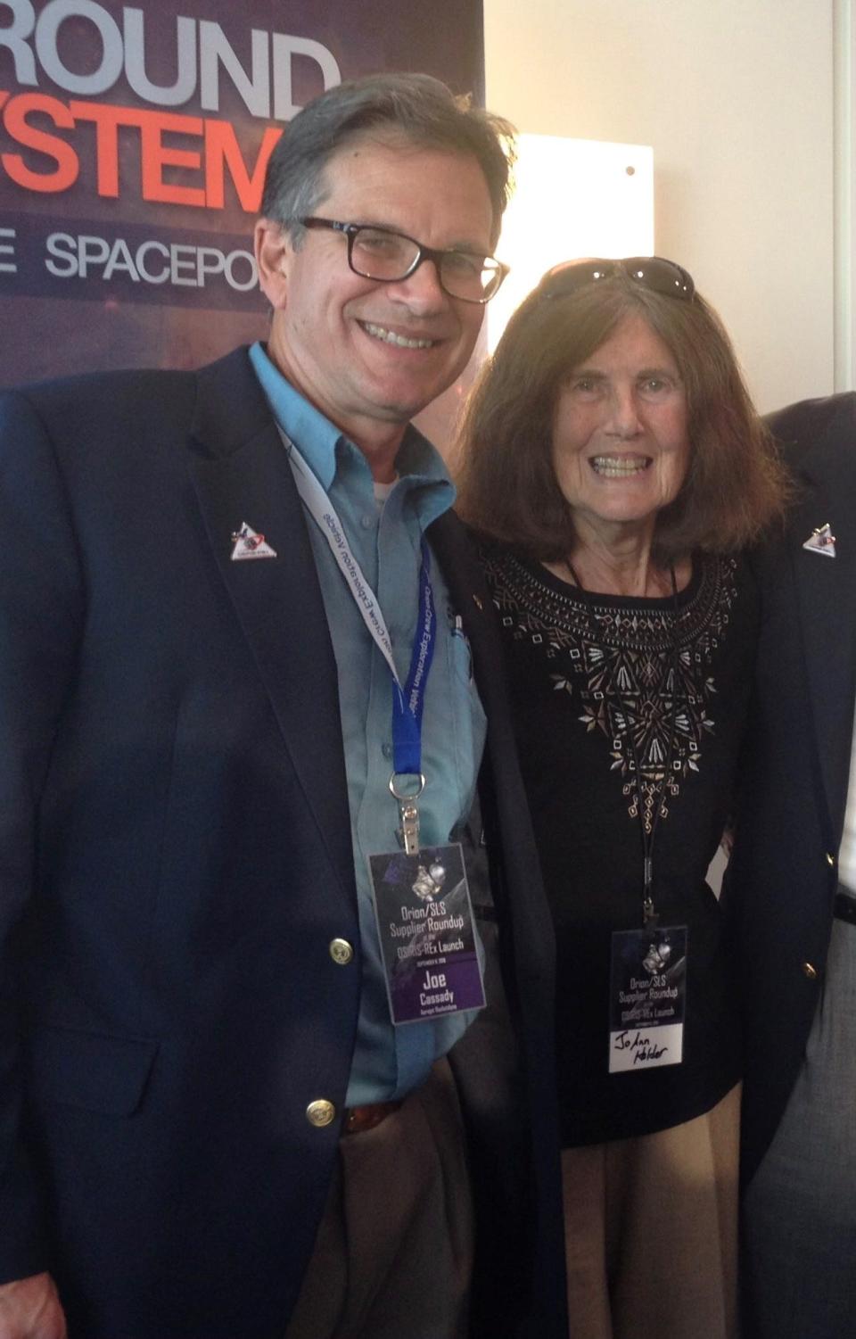 Joe Cassady stands with his mother Jo Ann Holder, whose remains will be sent to space on Celestis' Enterprise Flight, a deep space voyage taking hundreds of people's remains or partial DNA into space with the goal of orbiting the sun for eternity.