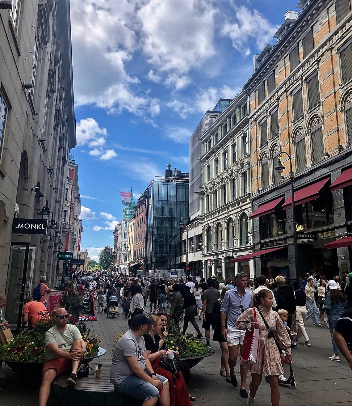 Tourists and locals jam the streets of Oslo’s city center unmasked on July 16, 2022, despite another highly contagious COVID-19 mutation, the BA.5 variant, circulating.