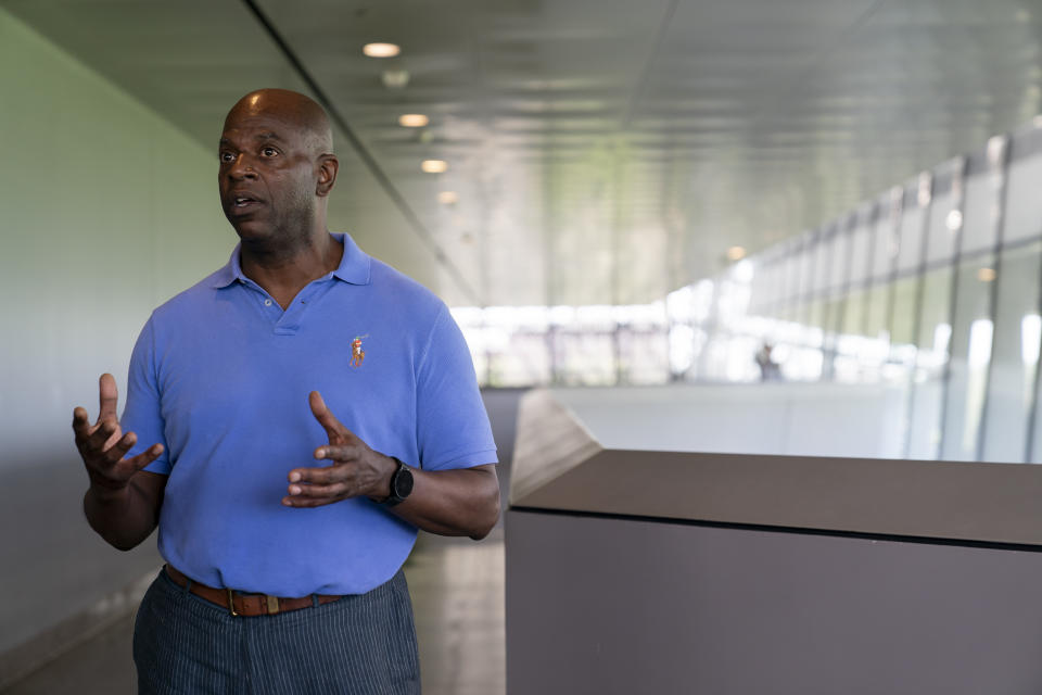 Aaron Bryant, museum curator of photography, visual culture and contemporary history at the Smithsonian Institution's National Museum of African American History and Culture, talks to The Associated Press about the Rev. Martin Luther King Jr.'s original speech from the 1963 March on Washington for Jobs and Freedom, Friday, Aug. 18, 2023, in Washington. (AP Photo/Stephanie Scarbrough)