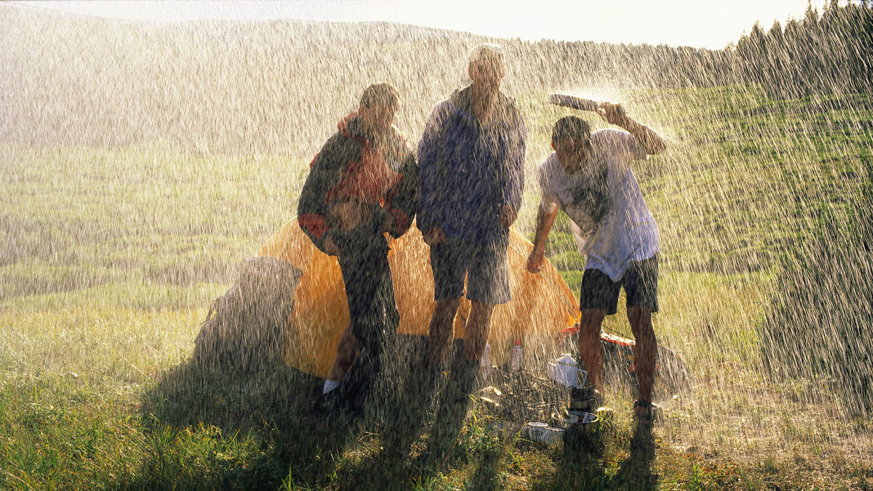  Campers Caught in a Downpour. 