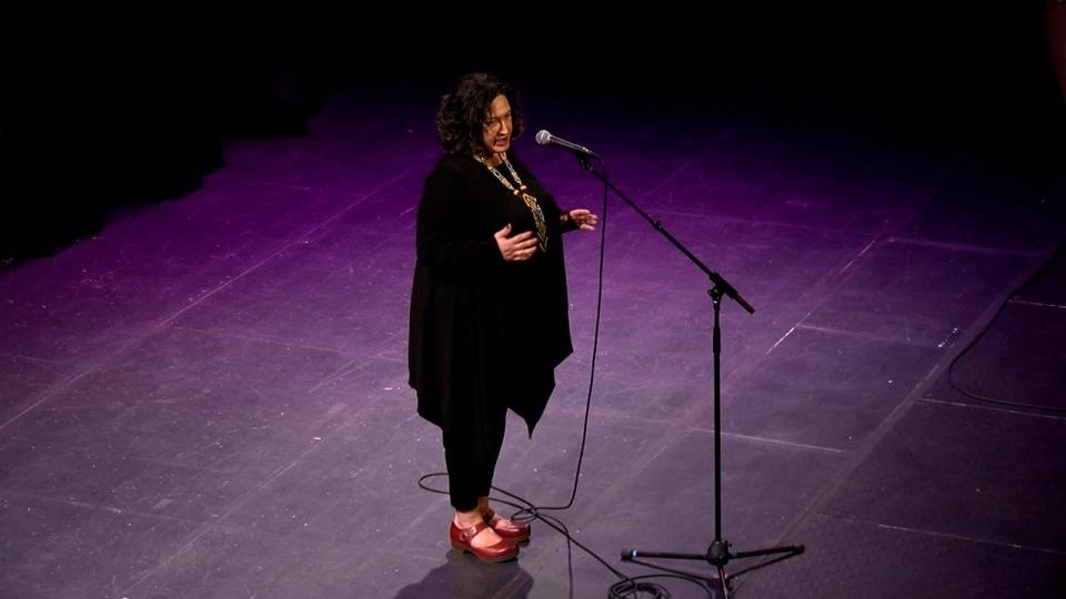 Anissa Deay tells her story during the Des Moines Storytellers Project's "Love" at Hoyt Sherman Place on Tuesday, Feb. 14, 2023.