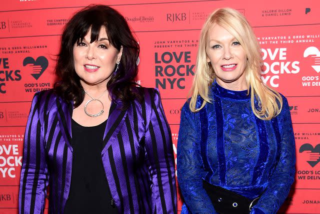 <p>Jamie McCarthy/Getty</p> Heart's Ann Wilson and Nancy Wilson at the Love Rocks NYC Benefit Concert on March 7, 2019