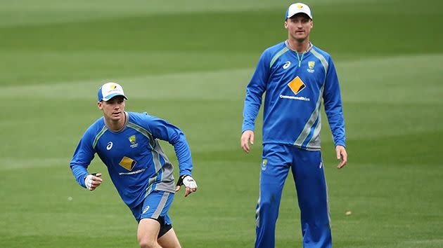 Bird (right) warms up with Peter Handscomb. Image: Getty