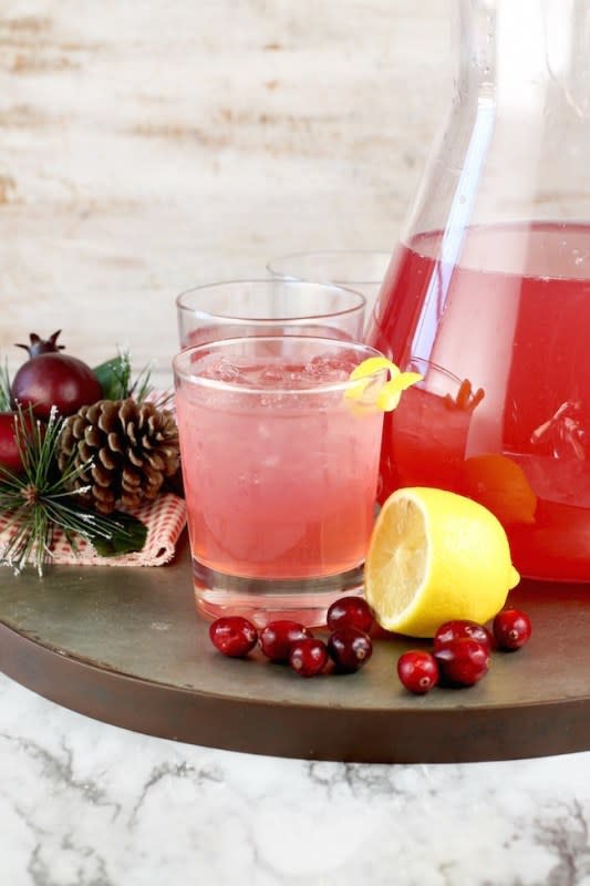 <p>Classic cosmopolitan cocktail with vodka and cranberry juice. </p><p><strong>Get the recipe: <a href="https://www.missinthekitchen.com/cosmopolitan-party-punch/" rel="nofollow noopener" target="_blank" data-ylk="slk:Cosmopolitan Party Punch;elm:context_link;itc:0;sec:content-canvas" class="link ">Cosmopolitan Party Punch</a></strong></p>