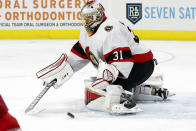 Ottawa Senators goaltender Anton Forsberg (31) blocks a shot by the Carolina Hurricanes during the second period of an NHL hockey game in Raleigh, N.C., Thursday, Dec. 2, 2021. (AP Photo/Karl B DeBlaker)