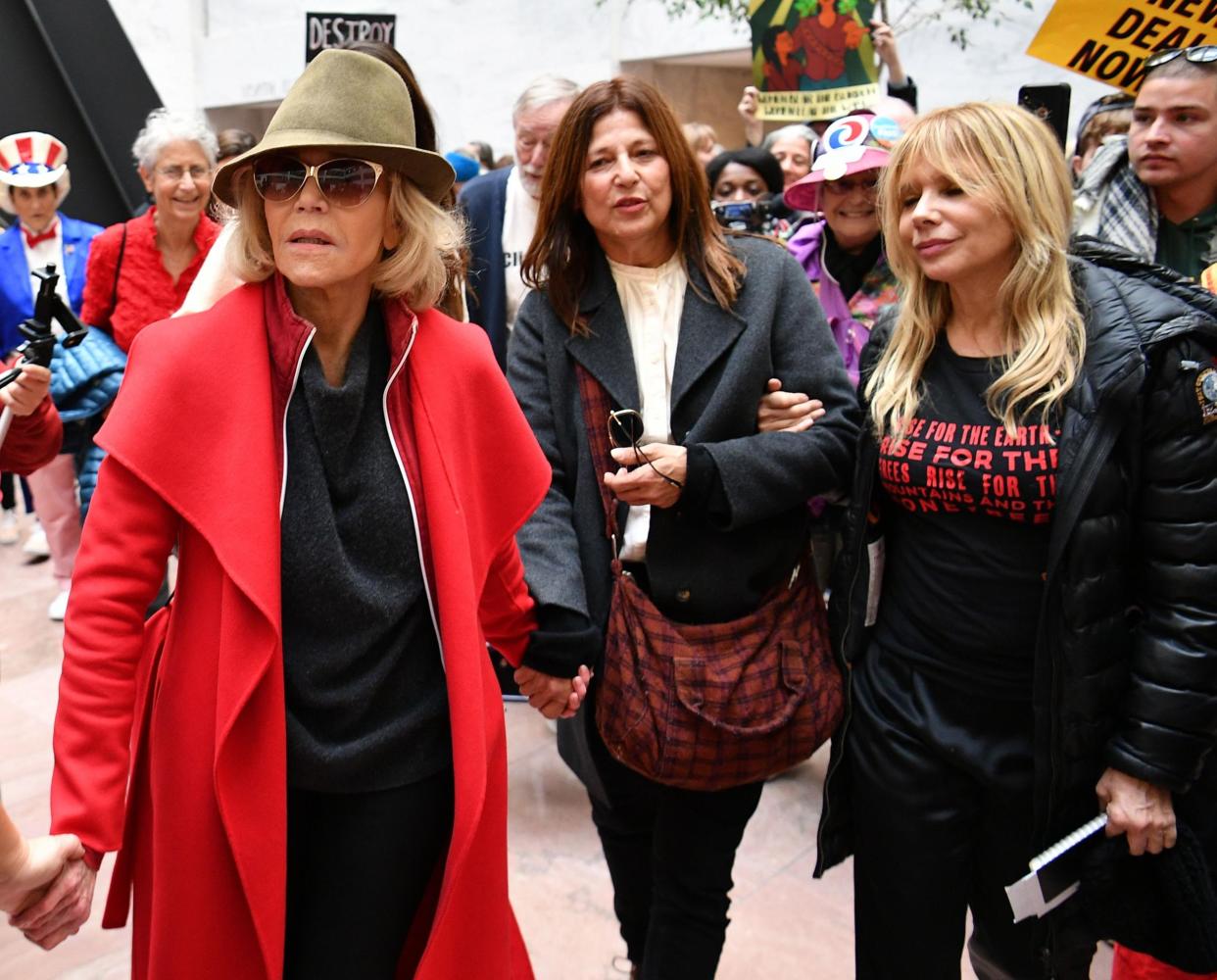 Jane Fonda, Catherine Keener and Rosanna Arquette walk inside the Hart Senate office building during a climate change protest on 1 November, 2019 in Washington, DC: MANDEL NGAN/AFP via Getty Images