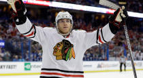 <p>The Blackhawks also signed Patrick Kane to an eight-year, $84M contract in 2014. (Chris O’Meara/AP) </p>