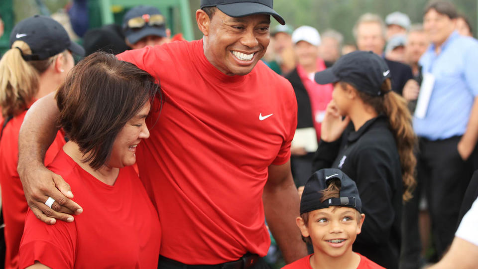 Tiger Woods celebrates with his family. (Photo by Andrew Redington/Getty Images)