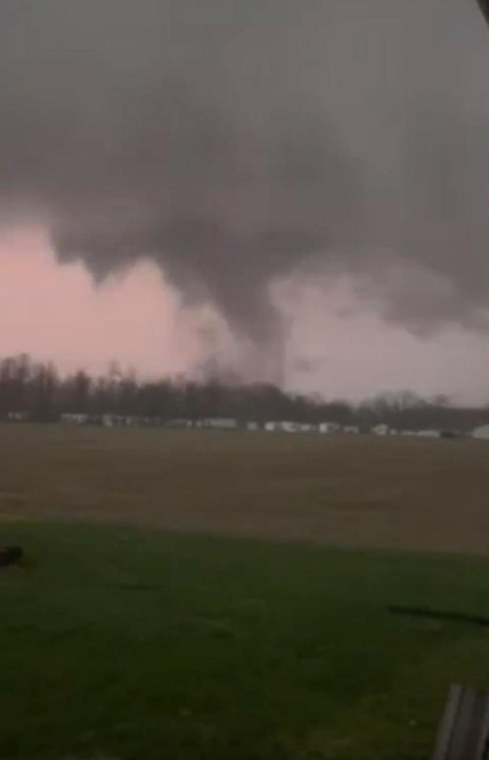 PHOTO: Lightning flashes while a tornado touches down near Fryburg, Ohio, on March 14, 2024. (Chad Steinke)