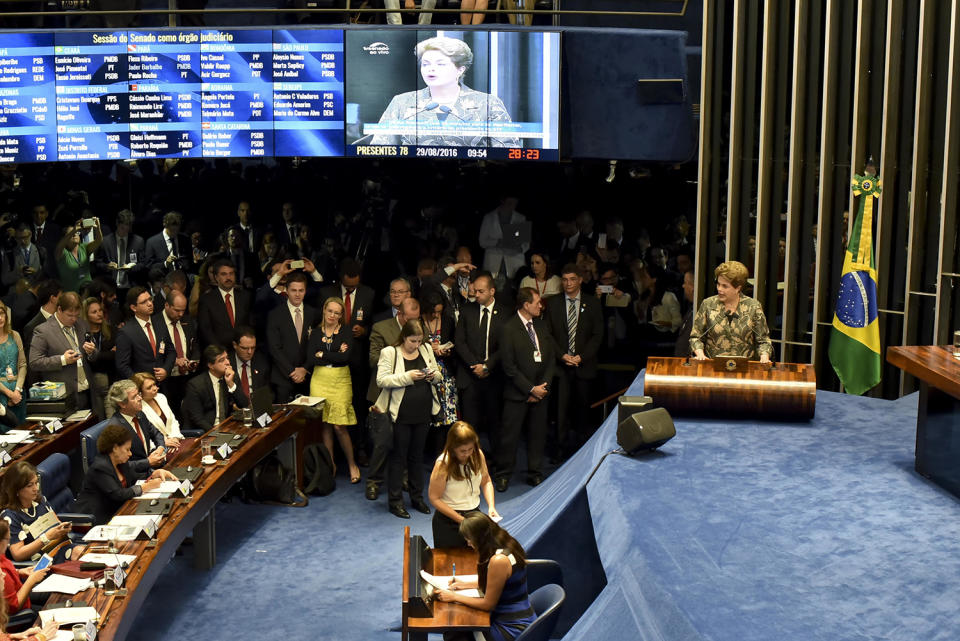 <p>Suspended Brazilian President Dilma Rousseff testifies on the Senate floor during her impeachment trial, Aug. 29, 2016, in Brasilia. (Photo: Ricardo Botelho/Brazil Photo Press/LatinContent/Getty Images) </p>