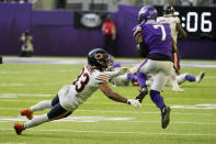 Minnesota Vikings cornerback Patrick Peterson (7) intercepts a pass in front of Chicago Bears wide receiver Dazz Newsome (83) during the second half of an NFL football game, Sunday, Jan. 9, 2022, in Minneapolis. Peterson returned the interception 66-yards for a touchdown. (AP Photo/Jim Mone)