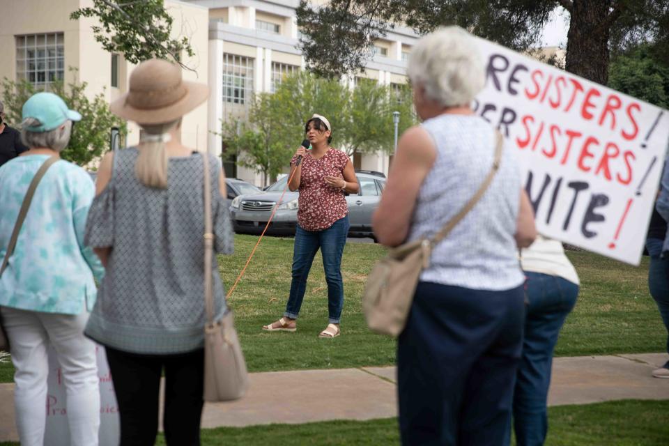 Las Cruces City Councilor Johana Bencomo speaks to abortion-rights advocates at Albert Johnson Park near City Hall to protest after a leaked draft opinion showed that the Supreme Court voted to strike down Roe v. Wade on Tuesday, May 3, 2022.