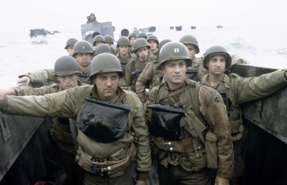 Men in a boat approaching beaches of Normandy