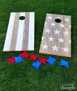 <p>Bean bag toss is a fun party game for kids and adults alike, and making your own patriotic cornhole boards is easier than you think. </p><p><strong><em>Get the tutorial from <a href="https://awonderfulthought.com/diy-cornhole-boards/" rel="nofollow noopener" target="_blank" data-ylk="slk:A Wonderful Thought;elm:context_link;itc:0;sec:content-canvas" class="link ">A Wonderful Thought</a>.</em></strong></p>