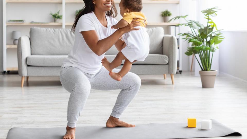 PHOTO: A woman exercises with her baby in this undated stock photo. (STOCK PHOTO/Getty Images)